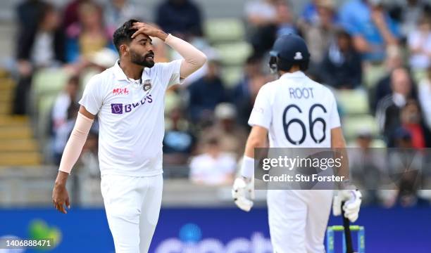 India bowler Mohammed Siraj reacts as England batsman Joe Root hits another boundary during the Fifth and final day of the Fifth Test Match between...