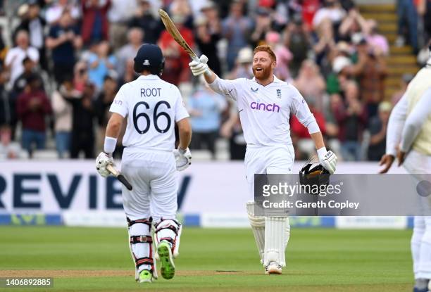 Jonathan Bairstow of England celebrates reaching his century with Joe Root during day five of Fifth LV= Insurance Test Match between England and...