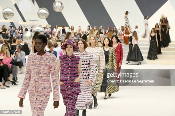 Models walk the runway during the Chanel Haute Couture Fall Winter 2022 2023 show as part of Paris Fashion Week on July 05, 2022 in Paris, France.