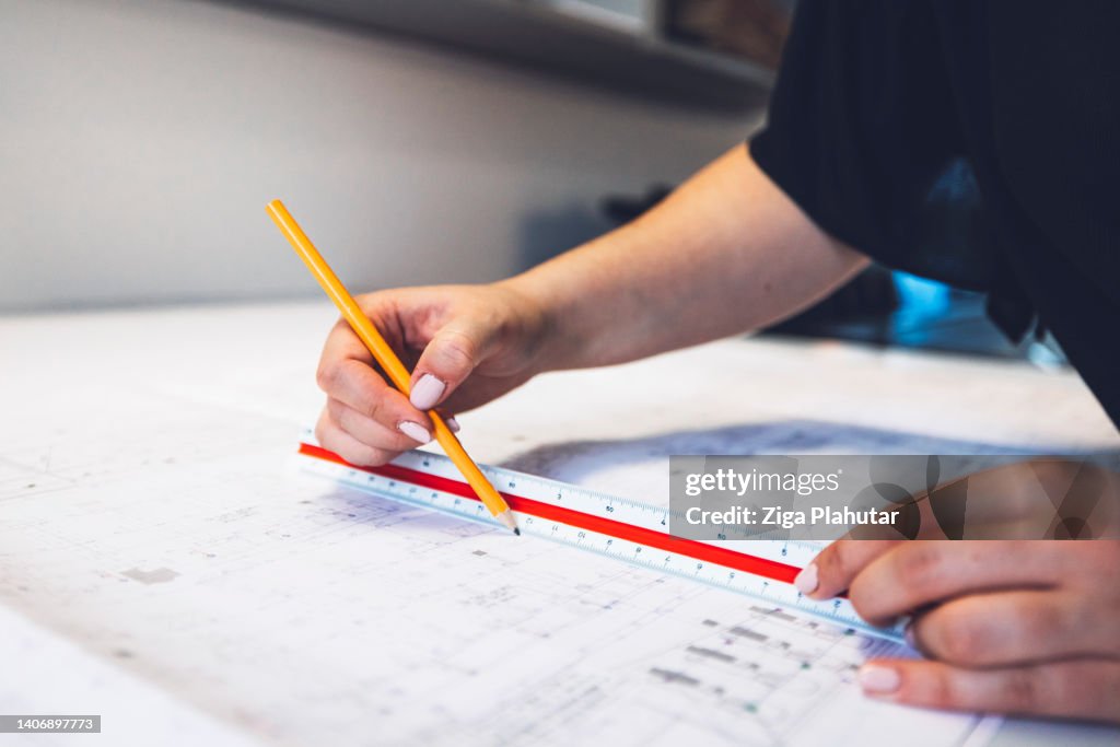 Drawing a straight line using a ruler