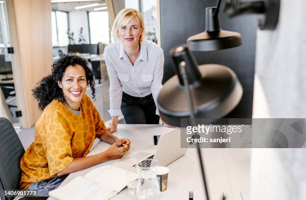 business people working in the office - associate producer stock pictures, royalty-free photos & images