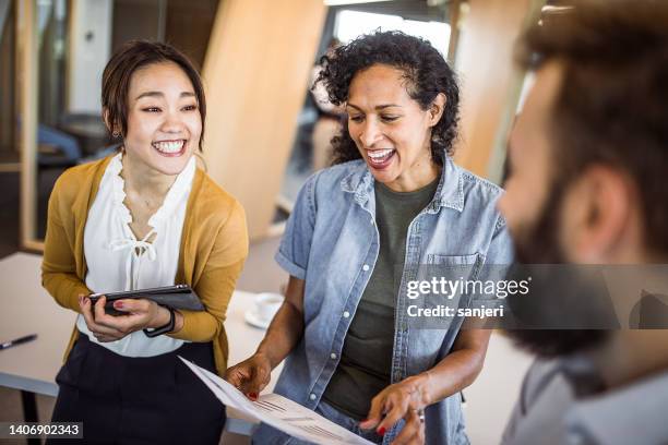 business people having a meeting - associate producer stock pictures, royalty-free photos & images