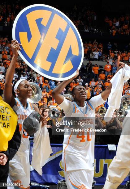 Glory Johnson and Shekinna Stricklen of the Tennessee Volunteers celebrate after defeating the LSU Tigers in the SEC Women's Basketball Tournament...