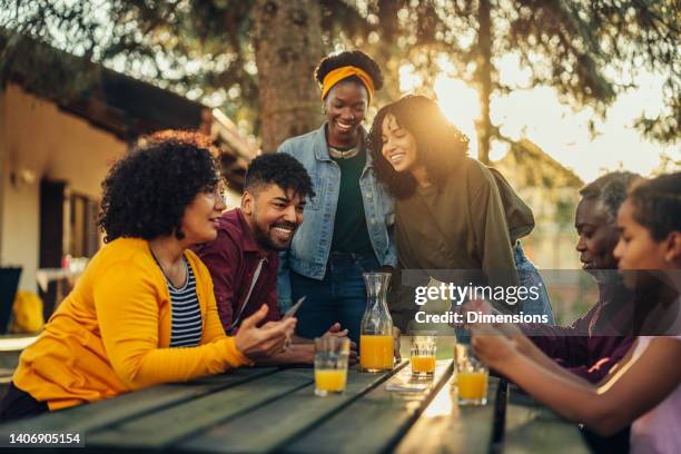 board games bring family together - woman playing squash stock pictures, royalty-free photos & images