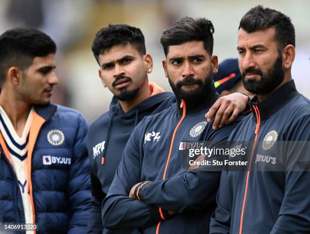 India players Shubman Gill, Shreyas Iyer, Mohammed Siraj and Cheteshwar Pujara look on after the Fifth and final day of the Fifth Test Match between...