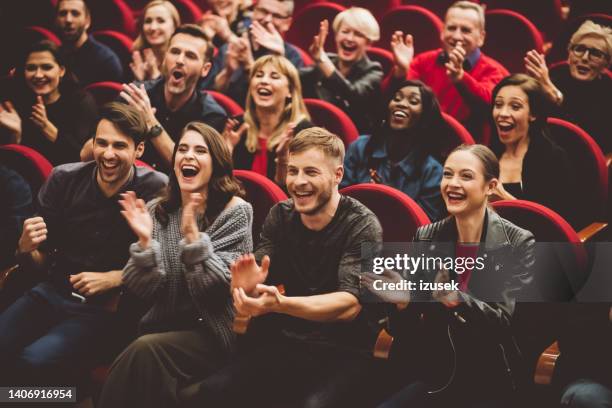 happy audience applauding in the theater - artist bildbanksfoton och bilder