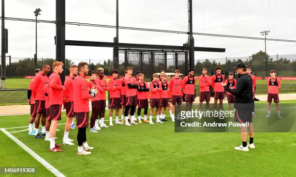 Jurgen Klopp manager of Liverpool talking with his players during a pre-season training session at AXA Training Centre on July 05, 2022 in Kirkby,...