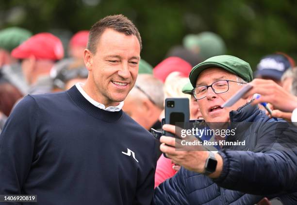 Former Footballer John Terry poses with a fan at the 1st hole during Day Two of the JP McManus Pro-Am at Adare Manor on July 05, 2022 in Limerick,...