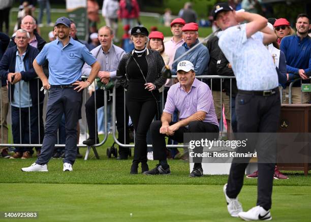 Sir Nick Faldo of England watches Jason Kokrak of United States on the 1st tee during Day Two of the JP McManus Pro-Am at Adare Manor on July 05,...