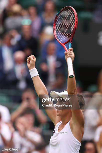 Tatjana Maria of Germany celebrates after winning against Jule Niemeier of Germany during their Women's Singles Quarter Final match on day nine of...