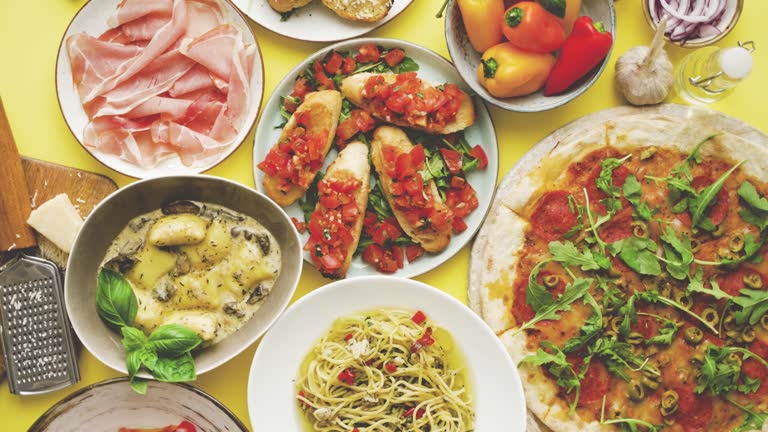 https://media.gettyimages.com/id/1406938295/video/various-assorted-italian-food-served-on-a-plates.jpg?b=1&s=640x640&k=20&c=r_aIHPKKbW0LEGaClJeucDT2t1vcAi8rA3vO9yGGY6I=