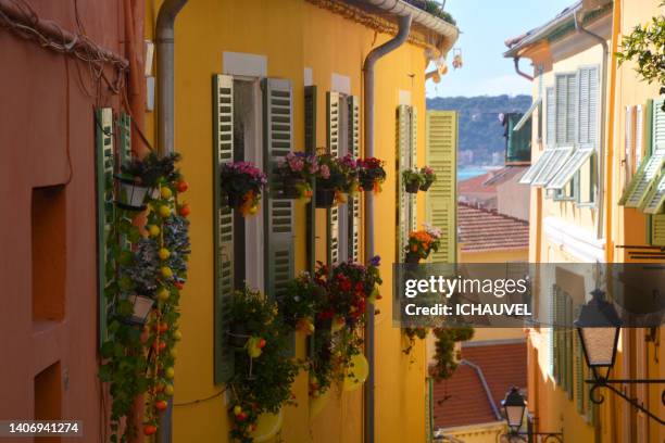 colorful houses with flowers  menton france - alpes maritimes stock pictures, royalty-free photos & images