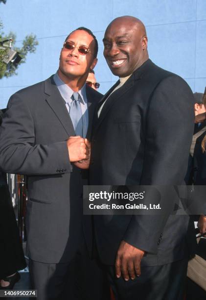 American actor and professional wrestler Dwayne Johnson and actor Michael Clarke Duncan attend a premiere of 'The Mummy Returns' at the Universal...