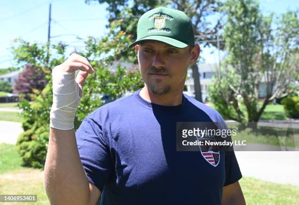Lifeguard Zachari Gallo outside of his home on July 4 who was bitten by a shark during a training exercise at Smith Point County Park in Shirley, New...