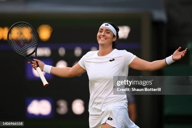 Ons Jabeur of Tunisia celebrates after winning match point against Marie Bouzkova of Czech Republic during their Women's Singles Quarter Final match...
