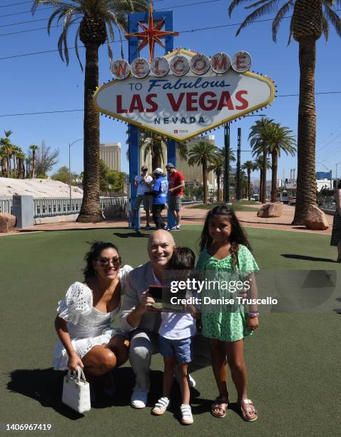 Bri Steck, Spi Entertainment Founder and CEO Adam Steck, Jude Steck and Sloan Steck pose for a photo with a Key to the Las Vegas Strip at the Welcome...