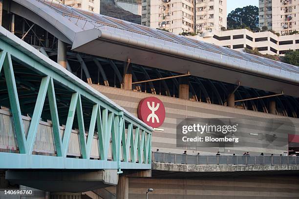 The MTR Corp. Logo is displayed outside the Lai King station in Hong Kong, China, on Friday, March 2, 2012. MTR is scheduled to announce earnings on...