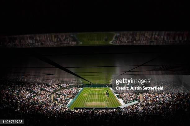 Tatjana Maria of Germany plays a backhand against Jule Niemeier of Germany during their Women's Singles Quarter Final match on day nine of The...