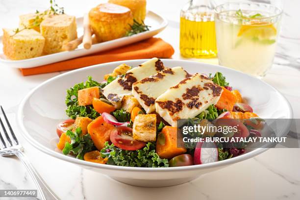 kale salad with halloumi cheese - greek food stock pictures, royalty-free photos & images