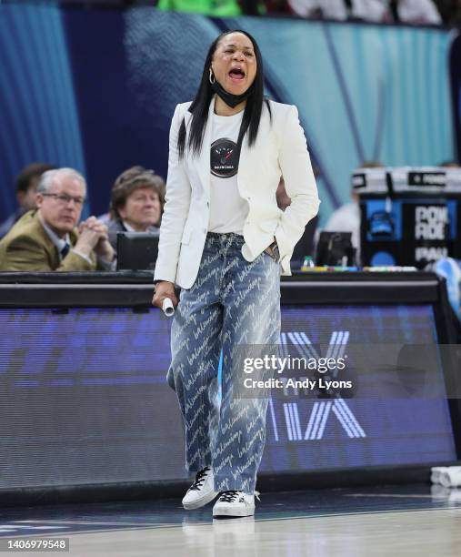 Dawn Staley the head coach of the South Carolina Gamecocks against the Louisville Cardinals in the semi-final game of the 2022 NCAA Women's...