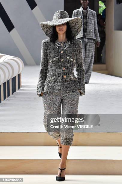 Model walks the runway during the Chanel Haute Couture Fall/Winter 2022-2023 fashion show as part of the Paris Haute Couture Week on July 5, 2022 in...