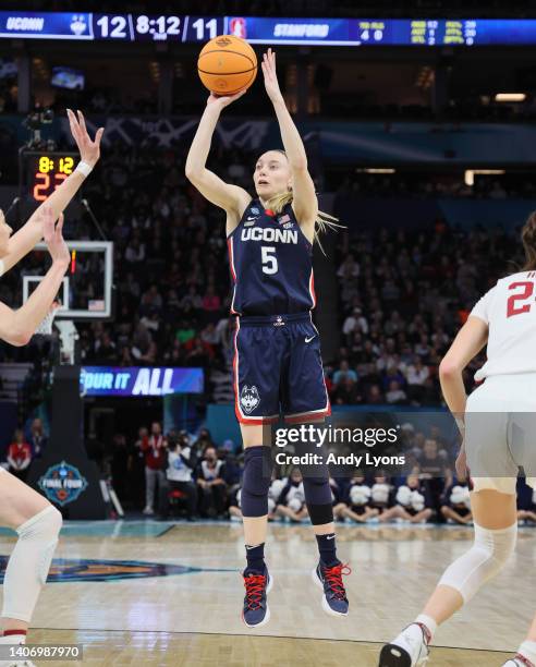 Paige Bueckers of the Connecticut Huskies against the Stanford Cardinal in the semi-final game of the 2022 NCAA Women's Basketball Tournament at...