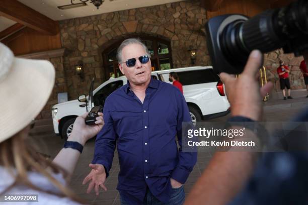 David Zaslav, President and CEO of Warner Bros. Discovery talks to the media as he arrives at the Sun Valley Resort for the Allen & Company Sun...
