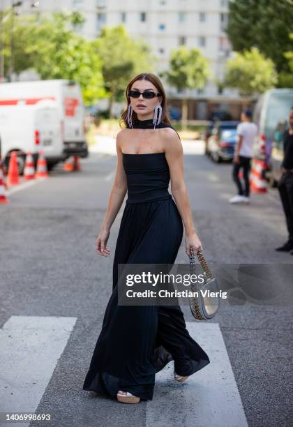Guest is seen outside Alexandre Vauthier Paris Fashion Week - Haute Couture Fall Winter 2022 2023 : Day Two on July 05, 2022 in Paris, France.