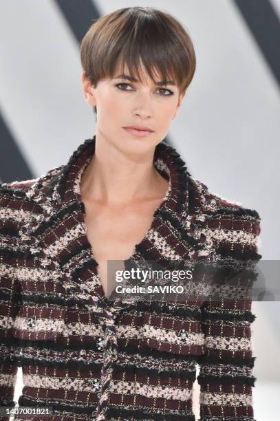 Model walks the runway during the Chanel Haute Couture Fall/Winter 2022-2023 fashion show as part of the Paris Haute Couture Week on July 5, 2022 in...