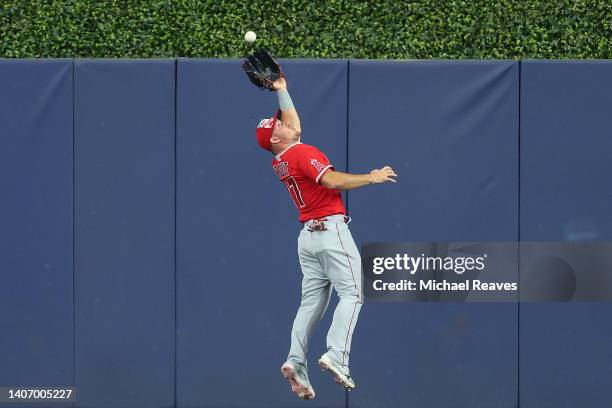 Mike Trout of the Los Angeles Angels catches a fly ball during the third inning against the Miami Marlins at loanDepot park on July 05, 2022 in...