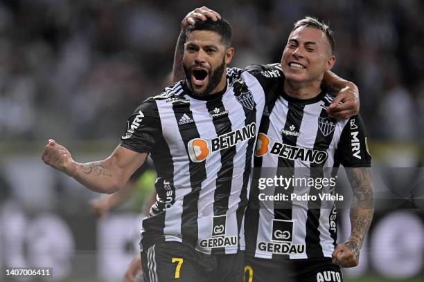 Hulk of Atletico Mineiro celebrates with Eduardo Vargas after scoring the first goal of his team during a Copa Libertadores round of sixteen second...