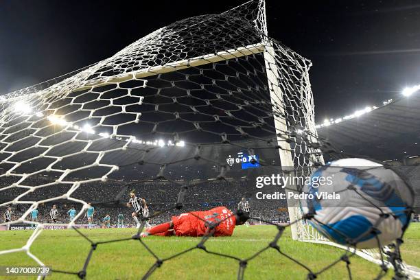 Hulk of Atletico Mineiro converts the penalty and scores the first goal of his team during a Copa Libertadores round of sixteen second leg match...