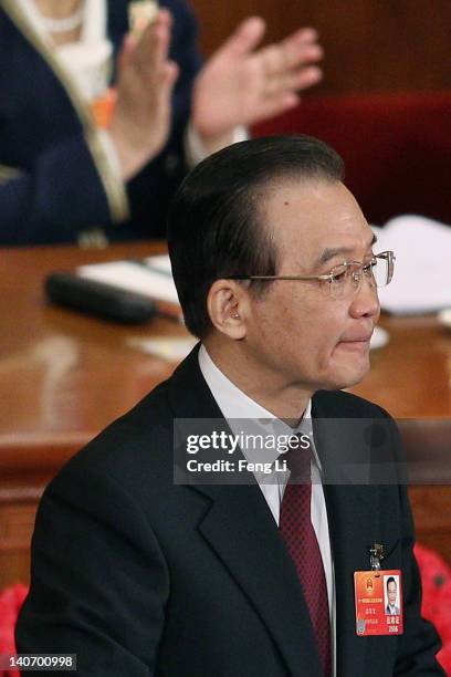 China's Premier Wen Jiabao delivers his government work report during the opening ceremony of the National People's Congress at the Great Hall of the...