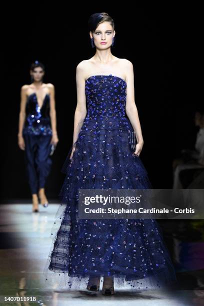 Model walks the runway during the Giorgio Armani Prive Haute Couture Fall Winter 2022 2023 show as part of Paris Fashion Week on July 05, 2022 in...