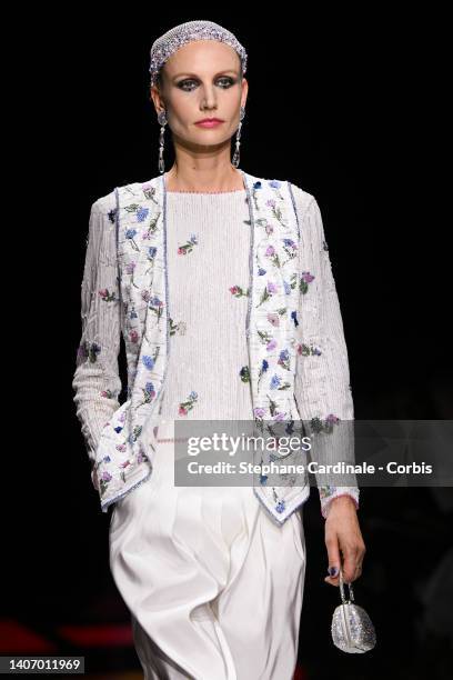 Model walks the runway during the Giorgio Armani Prive Haute Couture Fall Winter 2022 2023 show as part of Paris Fashion Week on July 05, 2022 in...