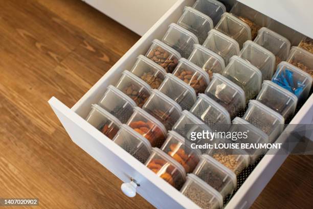 organised pantry drawer - speisekammer stock-fotos und bilder