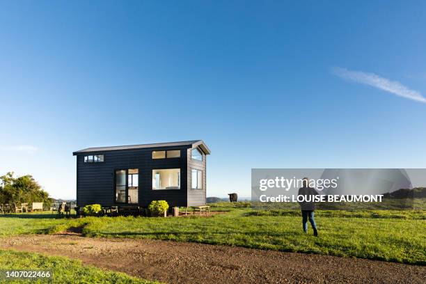 senior female farmer and her tiny home - small farm stock pictures, royalty-free photos & images