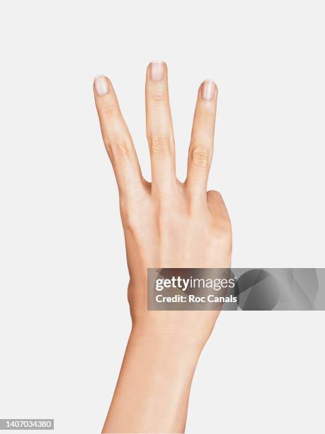 number three - three fingers stock pictures, royalty-free photos & images