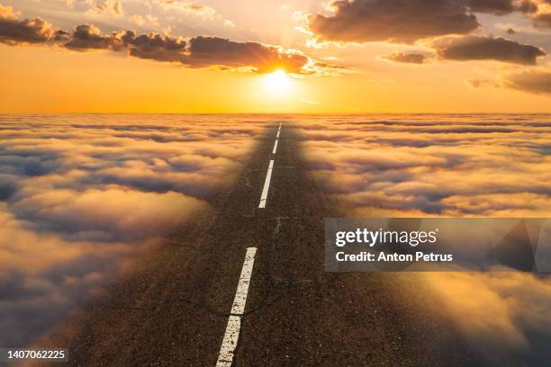 road in the clouds. paradise concept - reincarnation stock pictures, royalty-free photos & images