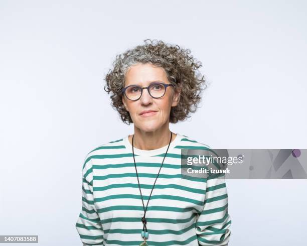 portrait of confident mature women - curly hair isolated stock pictures, royalty-free photos & images