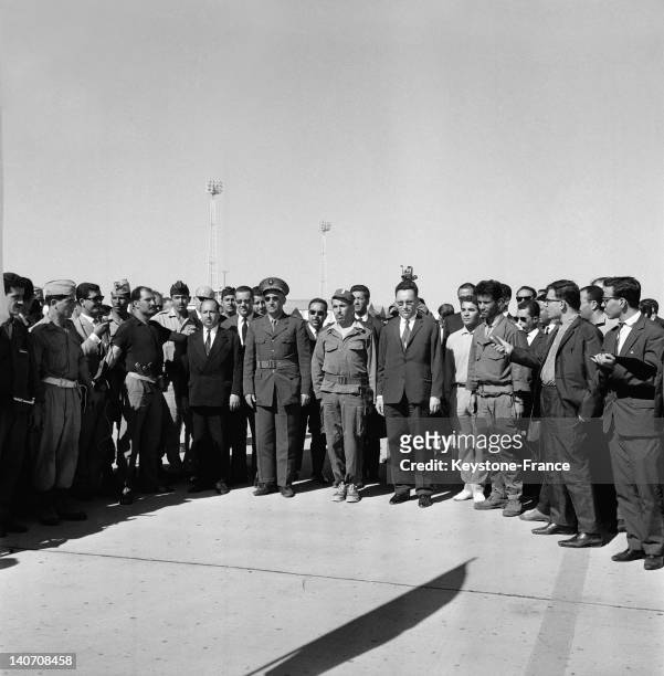 President Benyoucef Benkhedda with members of the provisional government of the Algerian Republic arrive on July 4, 1962 at Algiers airport, Algeria,...
