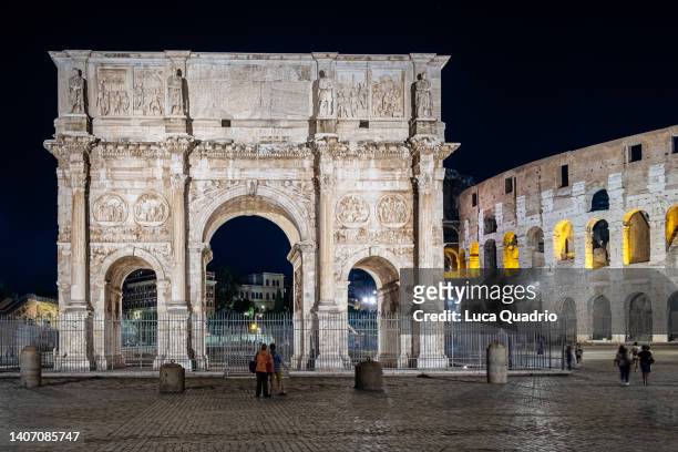 arch of constantine at night - arch of constantine stock pictures, royalty-free photos & images
