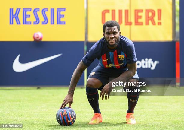 Franck Kessie poses for the media as he is presented as a FC Barcelona player at Ciutat Esportiva Joan Gamper on July 06, 2022 in Sant Joan Despi,...