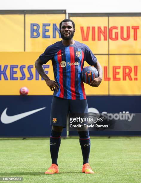 Franck Kessie poses for the media as he is presented as a FC Barcelona player at Ciutat Esportiva Joan Gamper on July 06, 2022 in Sant Joan Despi,...
