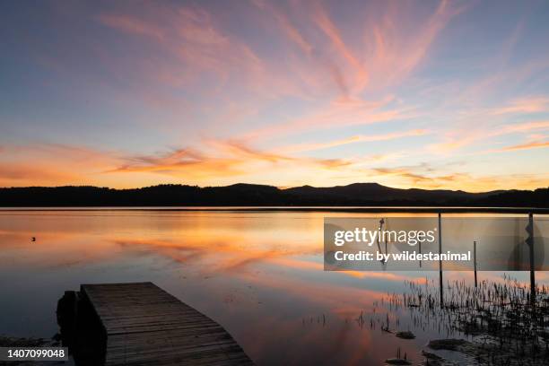 sunset at the merimbula boardwalk, nsw, australia. - orange new south wales stock pictures, royalty-free photos & images