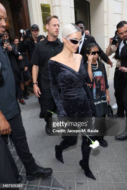 Kim Kardashian and Saint West depart at Balenciaga on July 06, 2022 in Paris, France.