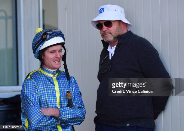 Luke Nolen and Trainer Peter Moody are seen during Melbourne Racing at Sandown Lakeside on July 06, 2022 in Melbourne, Australia.
