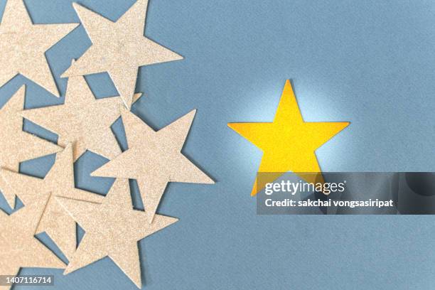 gold star - customer satisfaction rating ストックフォトと画像