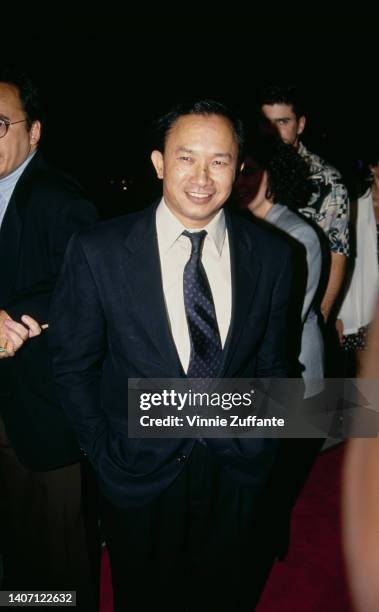 Hong Kong film director John Woo attends the Beverly Hills premiere of 'Hard Target,' held at the Academy Theatre in Beverly Hills, California, 18th...