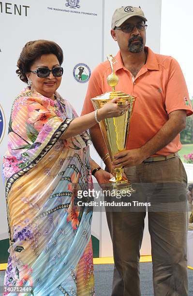 Harpreet Duggal , receives winner trophy of 7th edition of Madhavrao Scindia Golf Tournament from Madhavi Raje Scindia at Golf and Country club on...